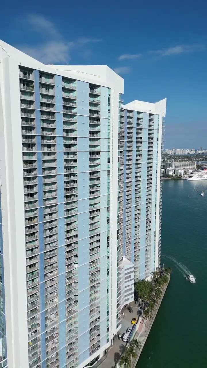 Frame from a property video: Waterfront tower from above